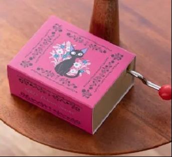 Nicky, la aprendiz de bruja Caja de música de manivela Kiki Flowers