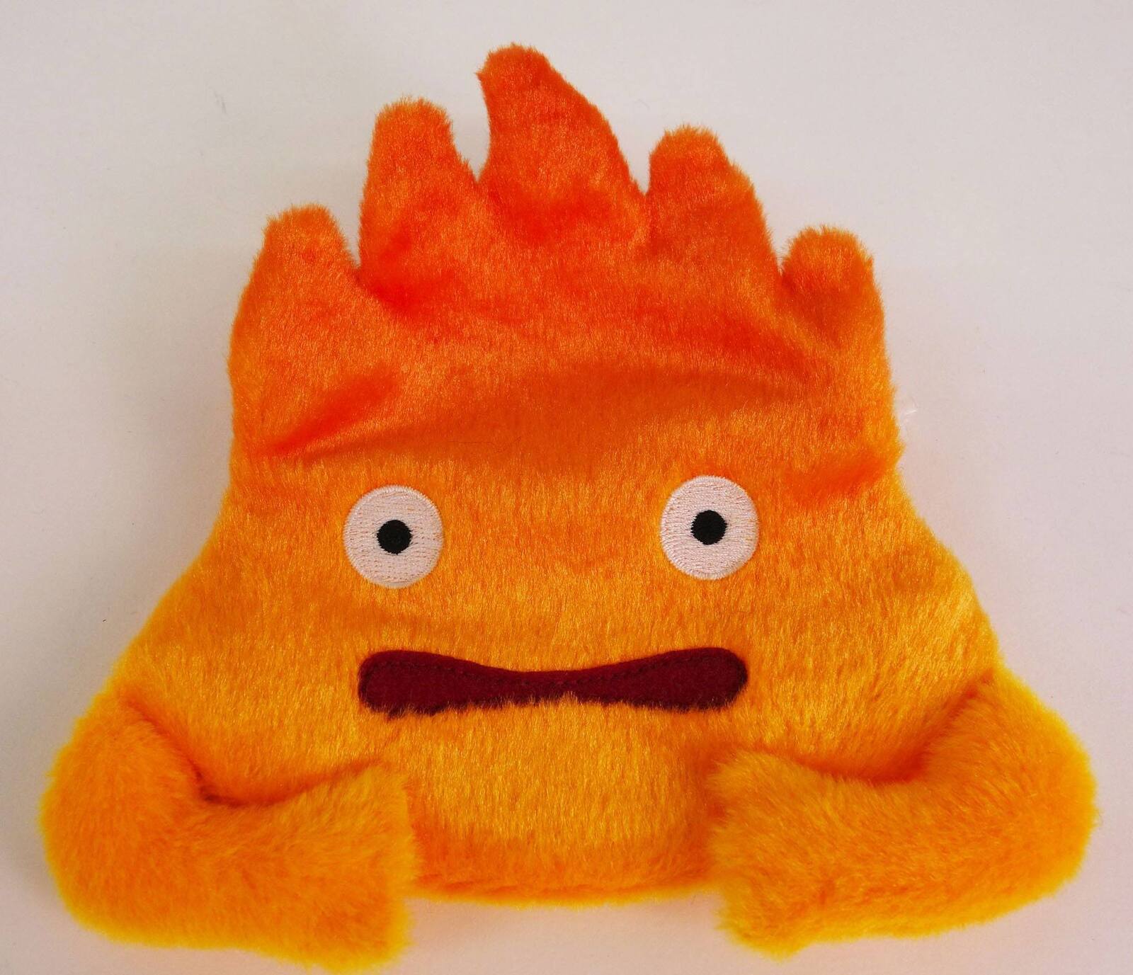 El castillo ambulante Llavero Monedero de Peluche Calcifer 12 cm Frikytopia