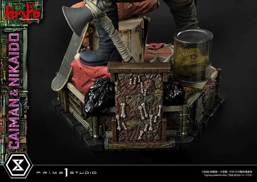 DOROHEDORO CAIMAN & NIKAIDO Estatua