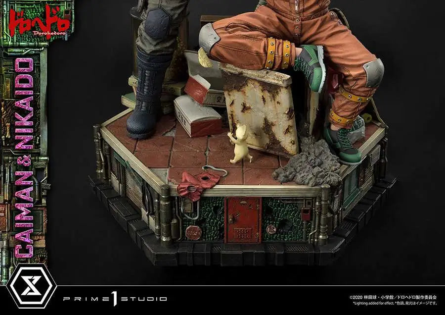 DOROHEDORO CAIMAN & NIKAIDO Estatua