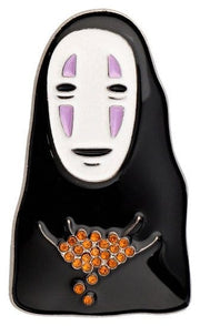 O Broche Metálico do Sem-Rosto de A Viagem de Chihiro